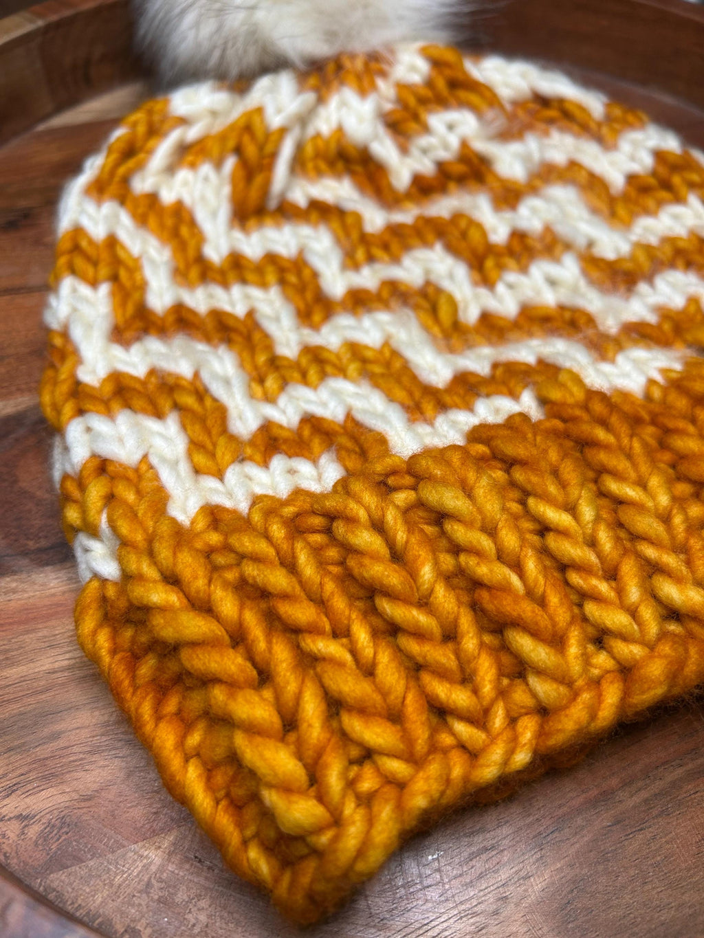 Handmade Merino Wool Knit Beanie: orange colour cable knit with Faux Fur Pompom