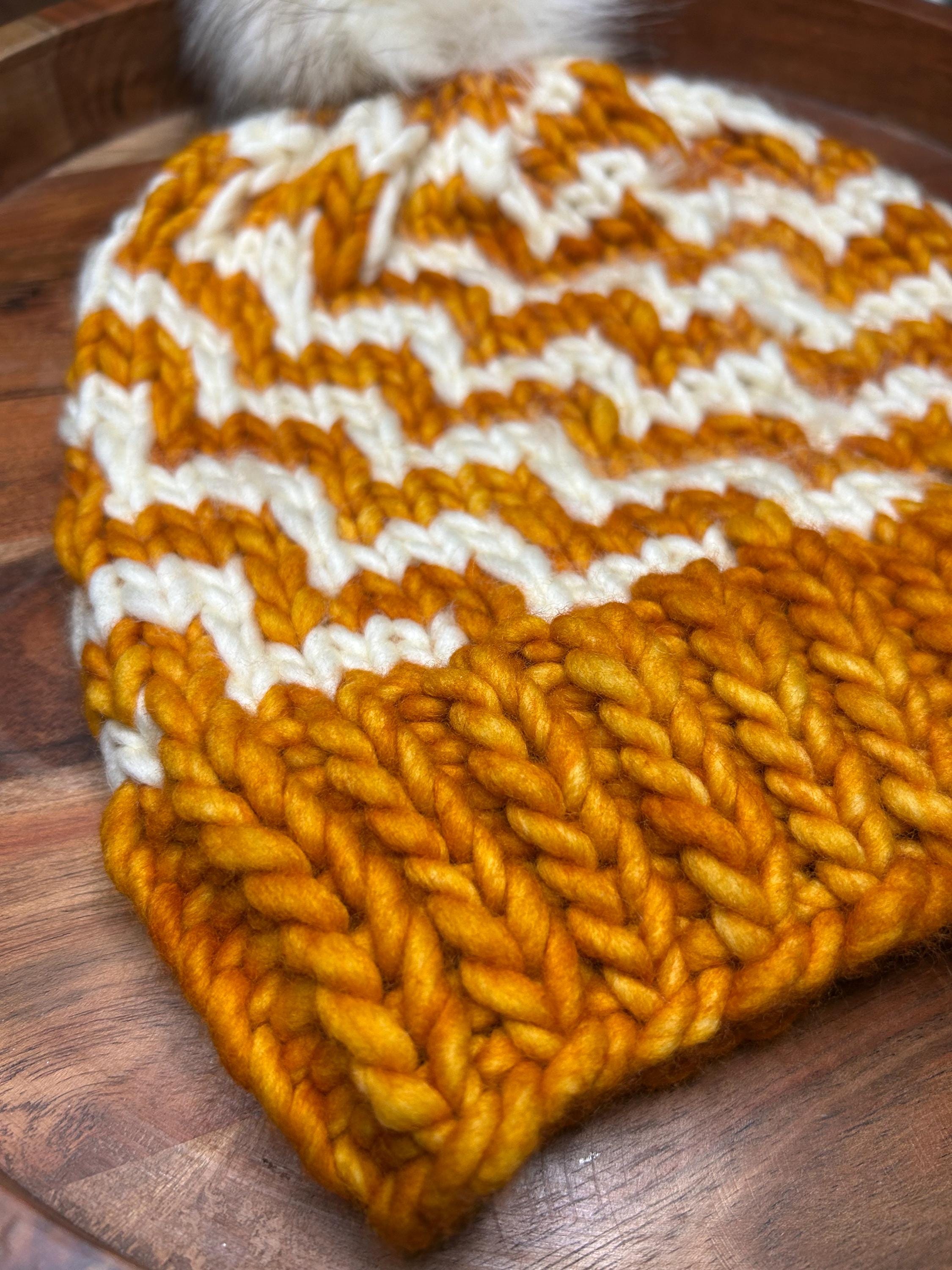 Handmade Merino Wool Knit Beanie: orange colour cable knit with Faux Fur Pompom