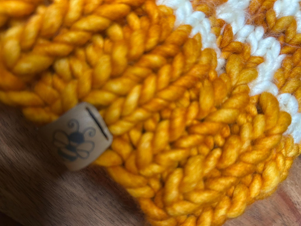 Handmade Merino Wool Knit Beanie: orange colour cable knit with Faux Fur Pompom