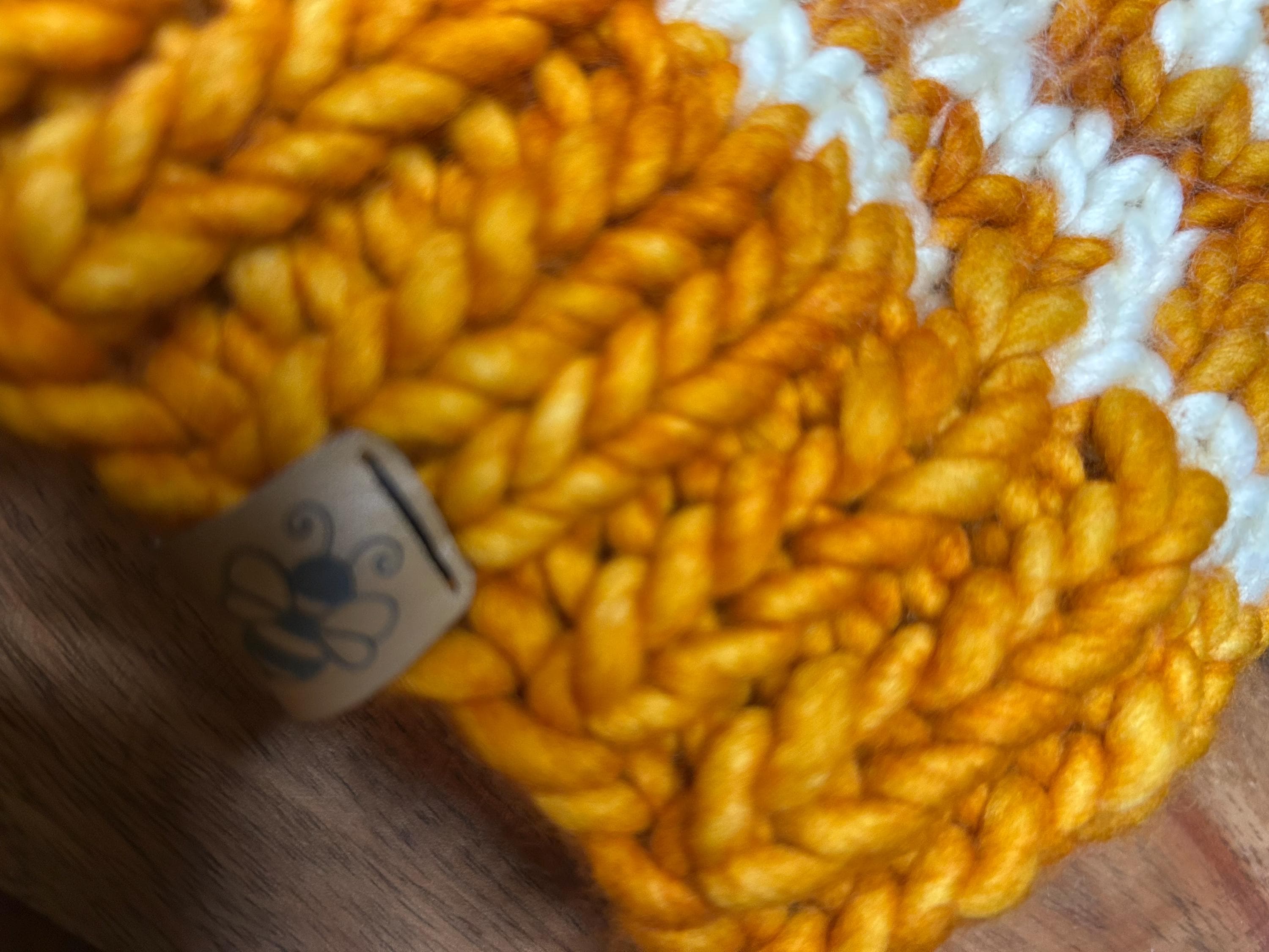 Handmade Merino Wool Knit Beanie: orange colour cable knit with Faux Fur Pompom