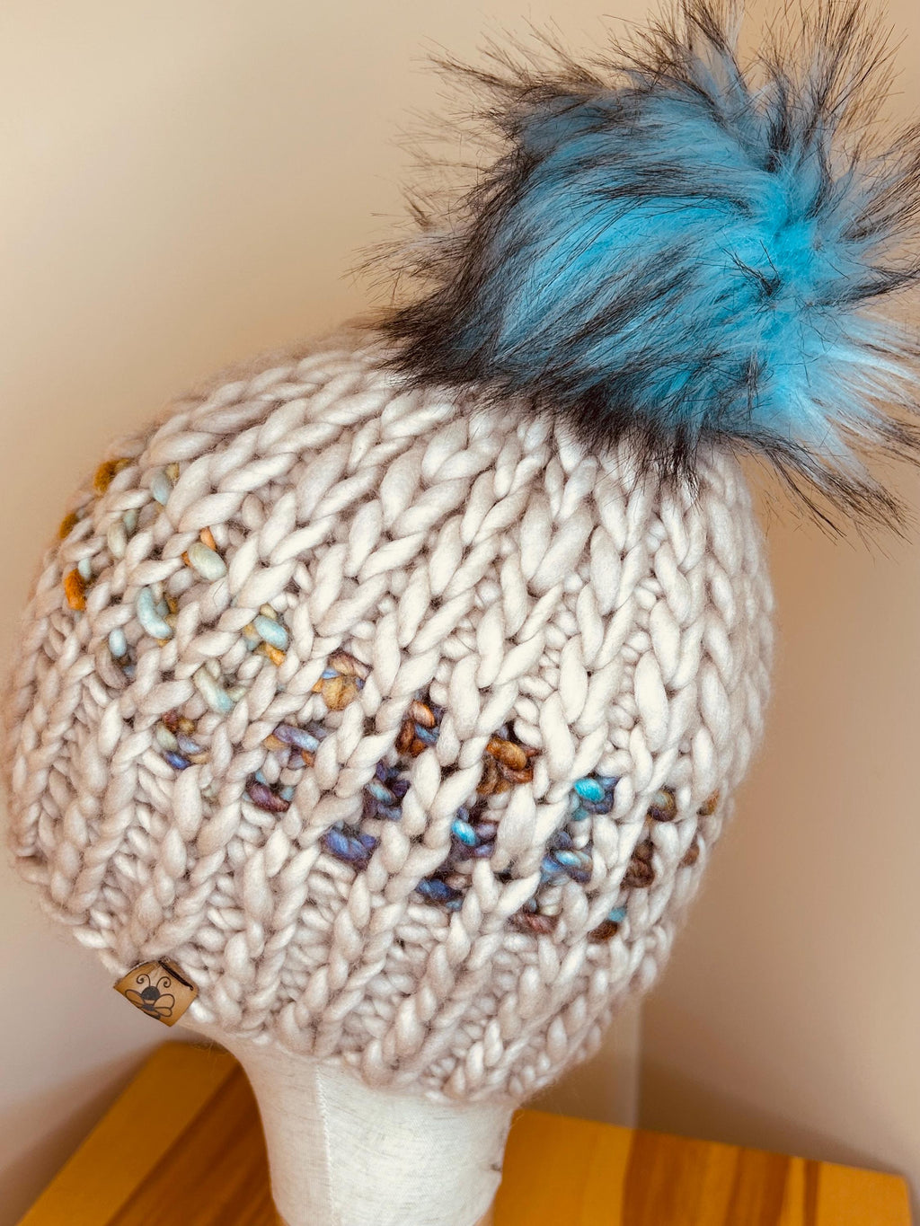 Handmade Merino Wool Knit Beanie: green blue beige knit with Faux Fur Pompom