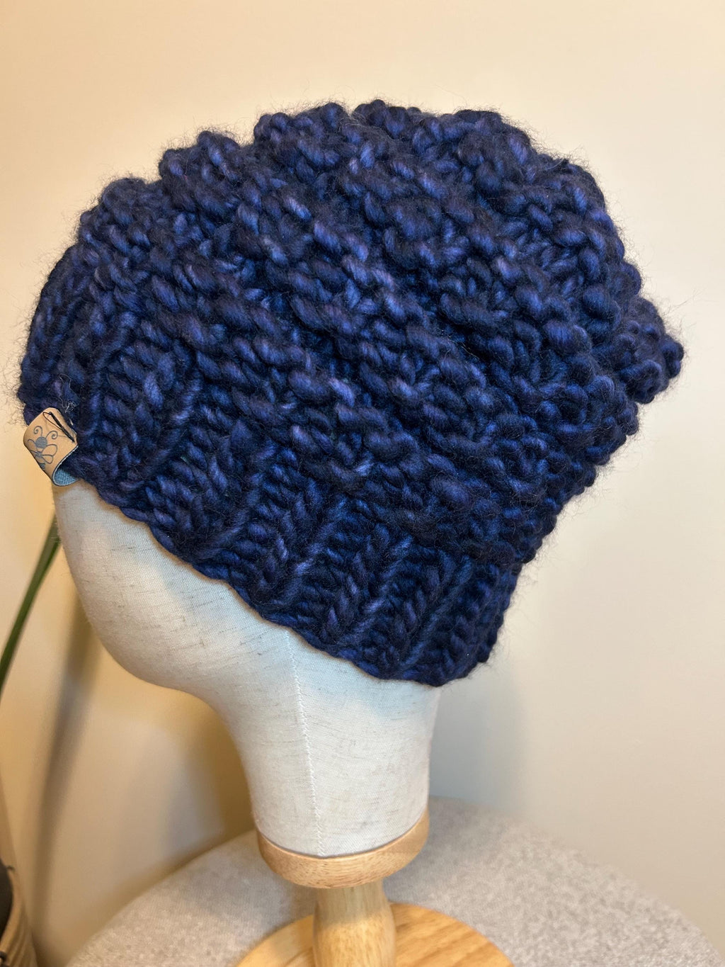 Handmade Merino Wool Knit Beanie: navy blue textured knit with Faux Fur Pompom