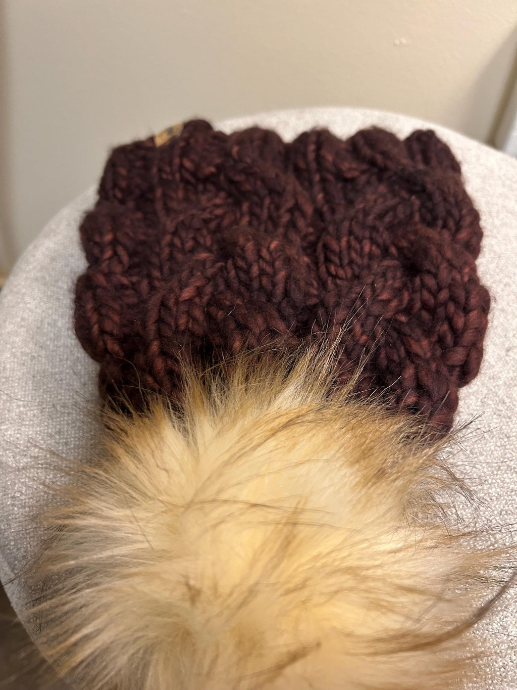 Handmade Merino Wool Knit Beanie: chocolate brown cable knit with Faux Fur Pompom