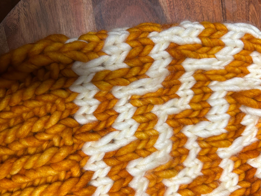 Handmade Merino Wool Knit Beanie: orange colour cable knit with Faux Fur Pompom