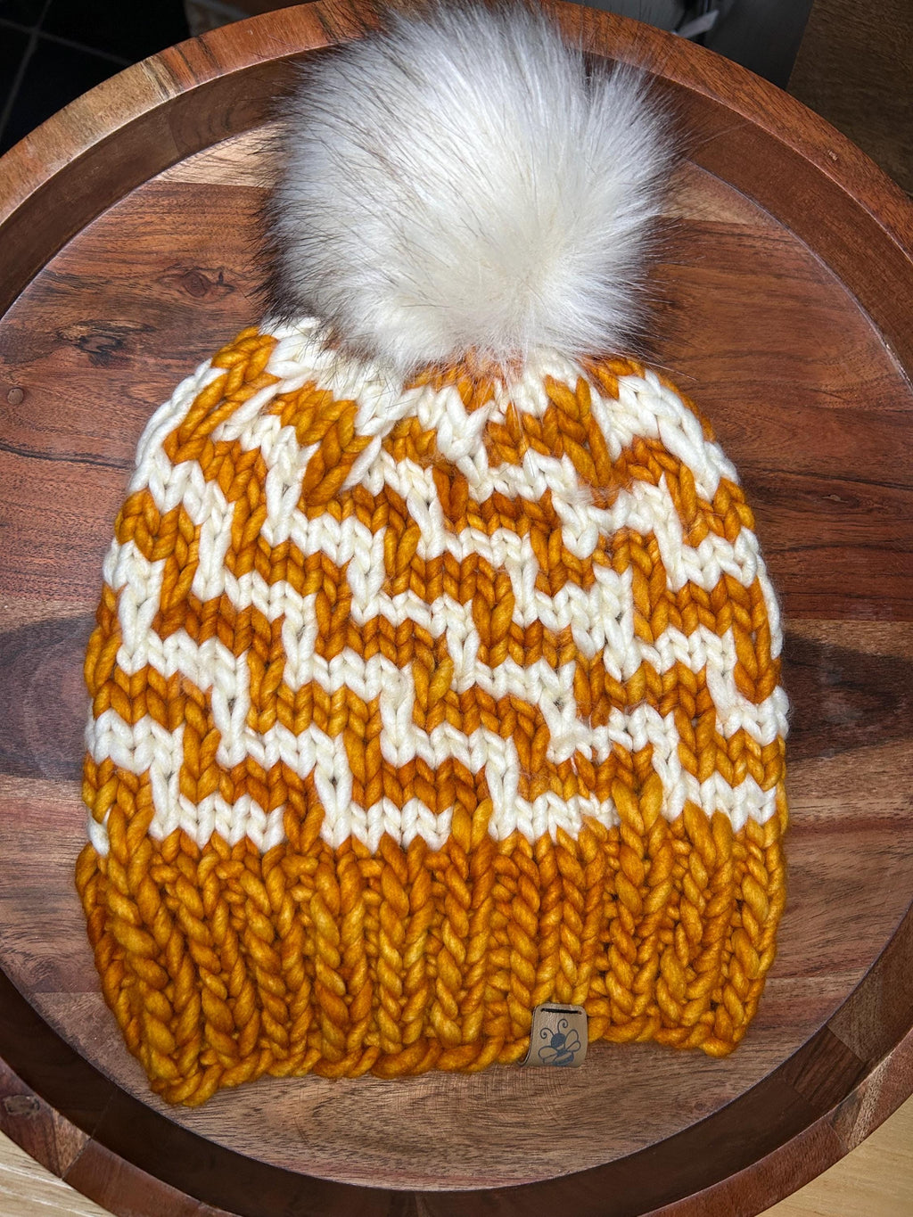 Handmade Merino Wool Knit Beanie: orange colour cable knit with Faux Fur Pompom