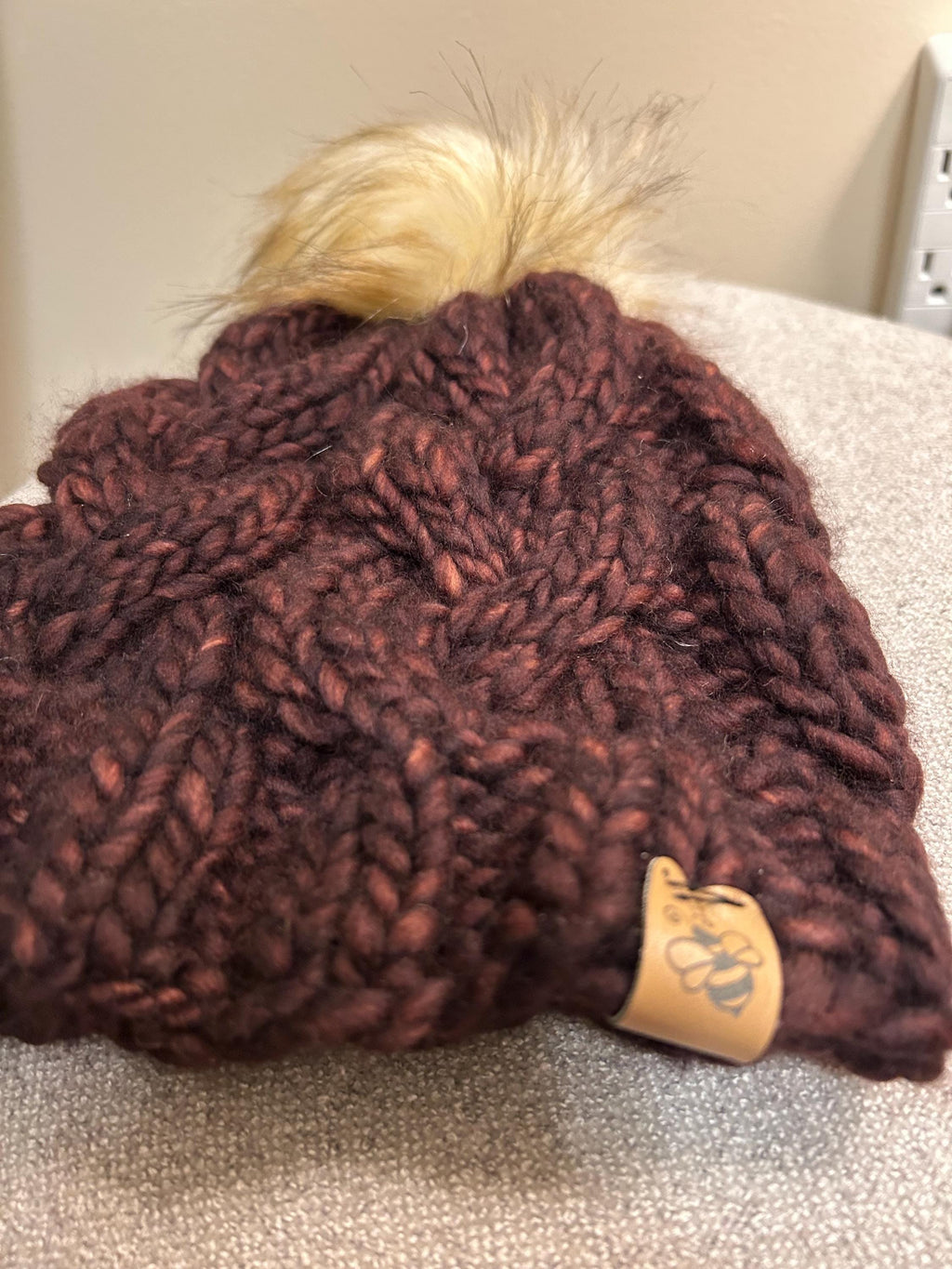 Handmade Merino Wool Knit Beanie: chocolate brown cable knit with Faux Fur Pompom
