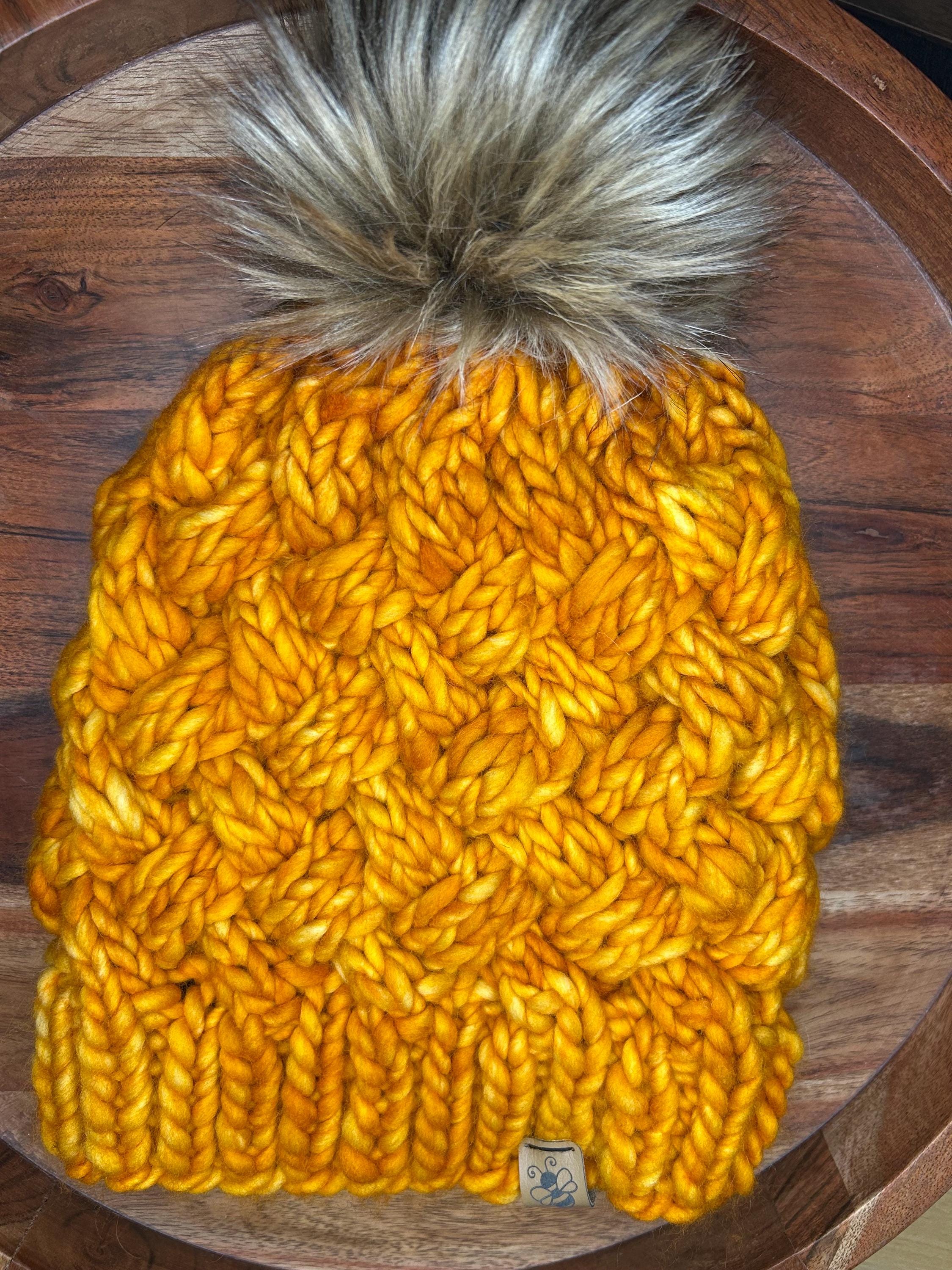 Handmade Merino Wool Knit Beanie: orange colour cable knit with Faux Fur Pompom